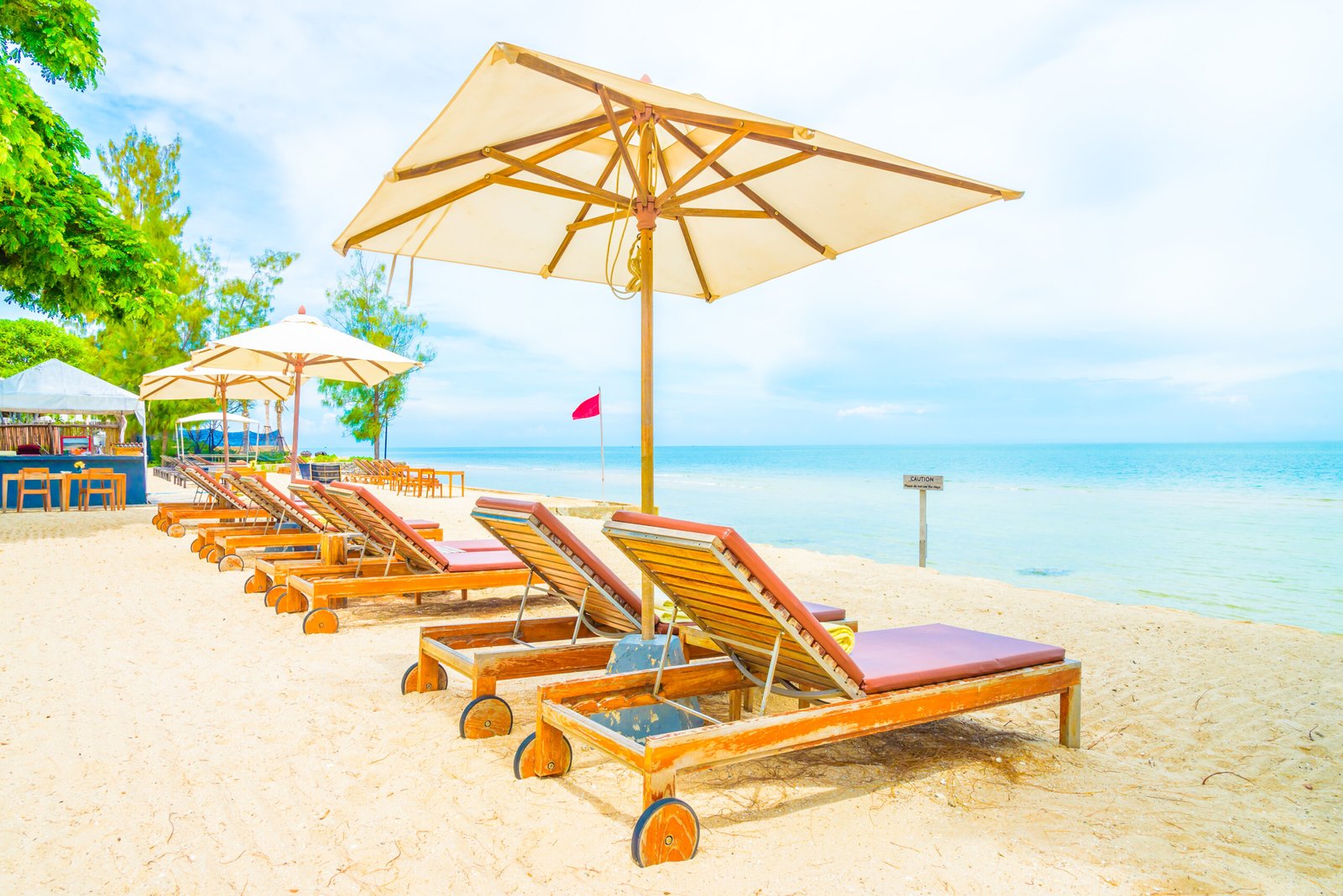 Umbrella and chair on beautiful tropical beach